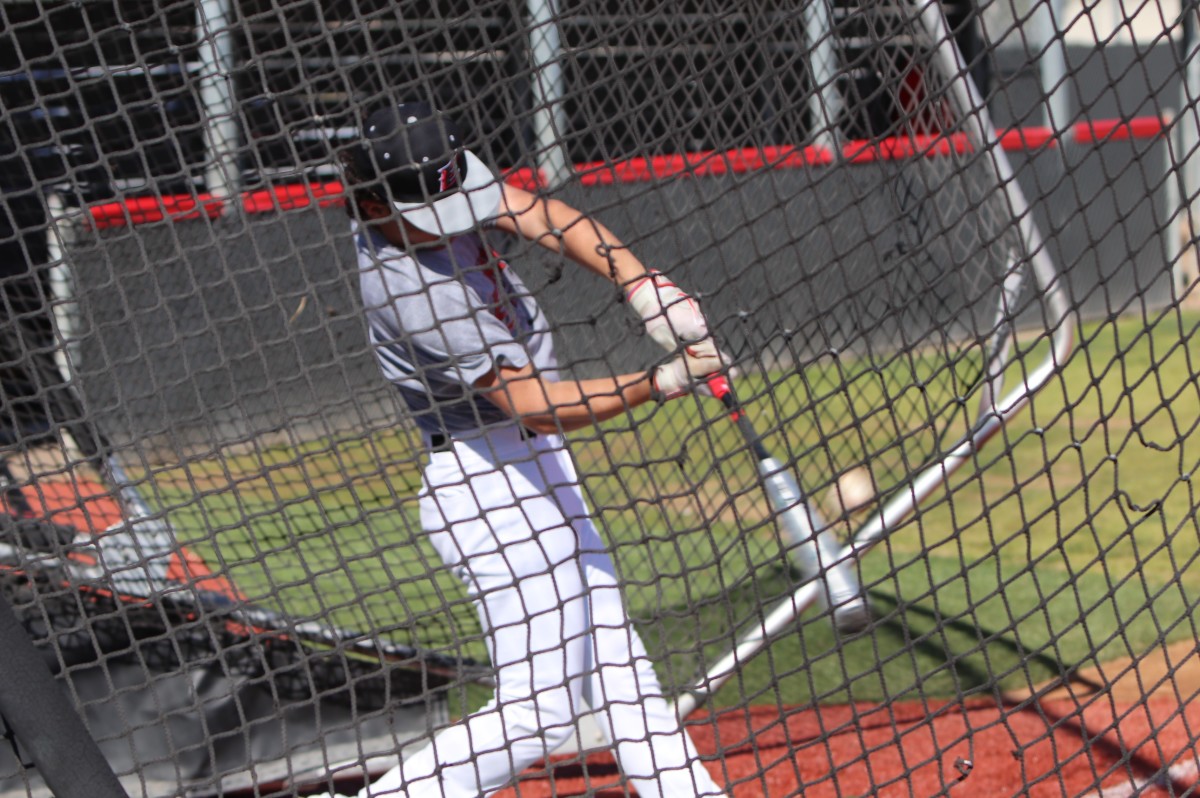 Trey powers the ball from the right side. 